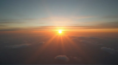 Sunset Horizon With Layered Vapor And Shadows
