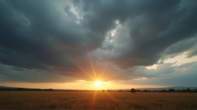 Sunset Sky With Dramatic Gray Clouds Over Field