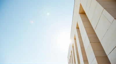 Tall Pale Stone Edifice Under Bright Sky
