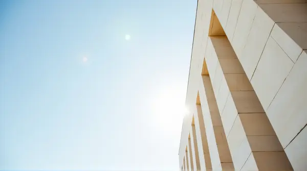 Tall Pale Stone Edifice Under Bright Sky
