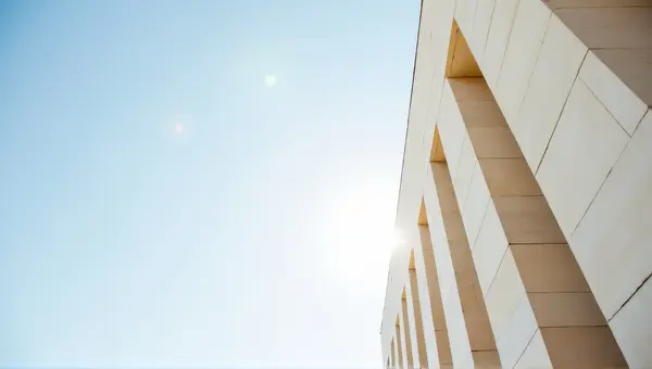Tall Pale Stone Edifice Under Bright Sky