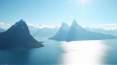 Tall Peak With White Summit Over Shimmering Water