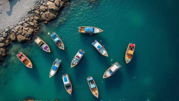 Top-Down Boats Clustered Near Coastal Shoreline