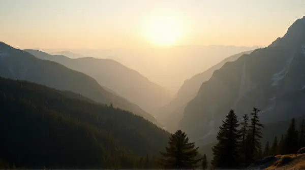 Towering Mountain Range Beyond Lush Woodland