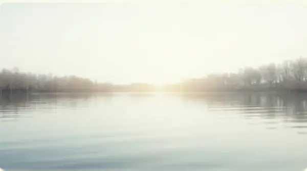 Tranquil Dawn Lake Surface With Gentle Ripples