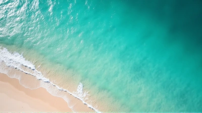 Turquoise Ocean Meeting Pale Beach From Above