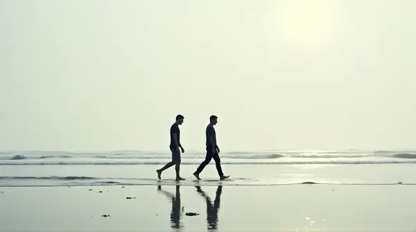 Two People Walking On Coastal Edge With Footprints