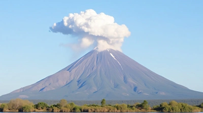 Volcano Eruption With White Smoke And Clear Sky