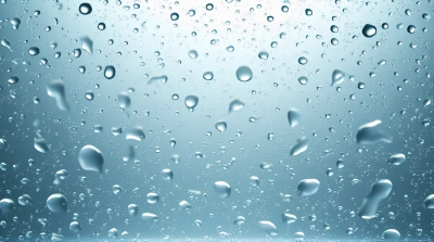Water Droplets On Glass Panel With Light Reflection