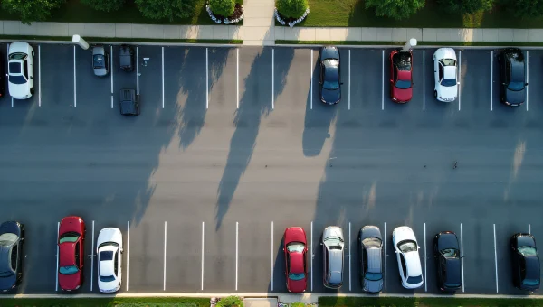 Aerial View of Busy Parking Lot at Midday