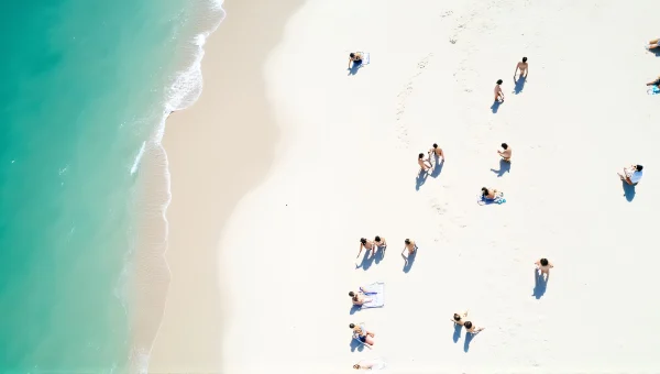 Aerial View of People Relaxing on White Sand Beach