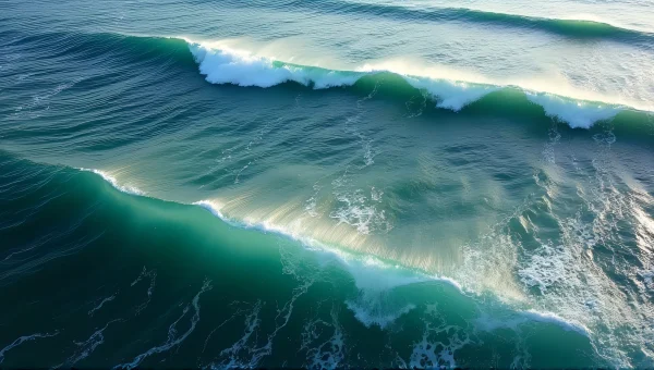 Aerial View of Sea Waves and White Foam Lines
