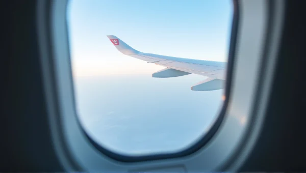 Airplane Wing Tip Close-Up Through Window