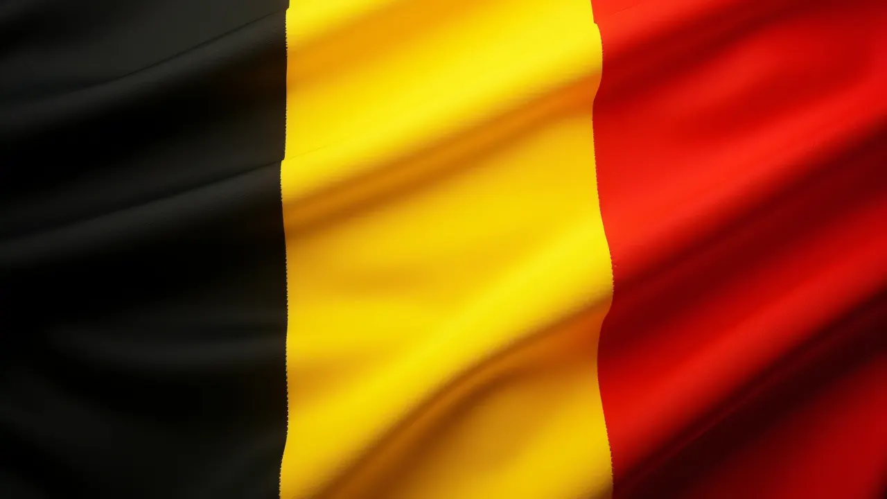 Close-up view of the Belgium flag showcasing textured fabric in tricolor.