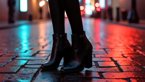 Black Leather Peep-Toe Wedge Booties On Cobblestones