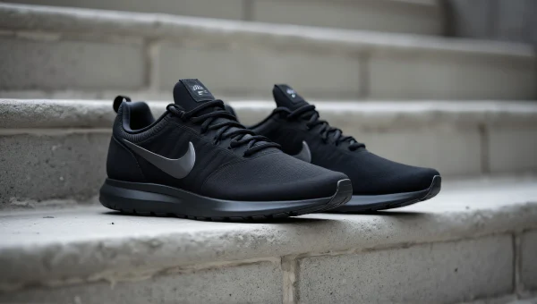 Black Nike Shoes on Concrete Staircase
