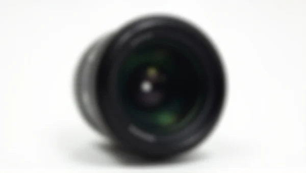 Black Zoom Camera Lens Close-Up on White Background