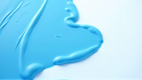 Blue Paint Close-Up on White Surface Texture
