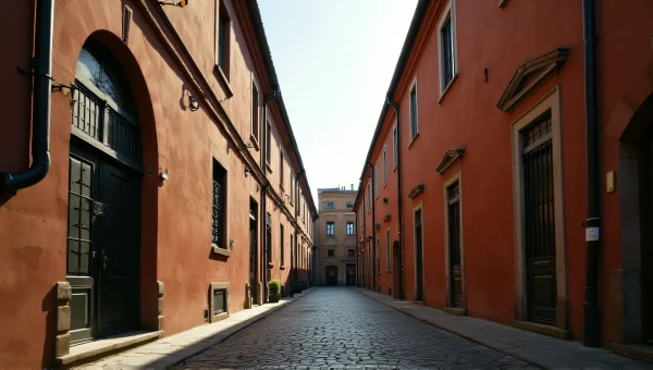 Brown Concrete Buildings Facing Cobblestone Alley