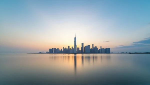 Calm Water Reflection of Urban Skyline at Sunset