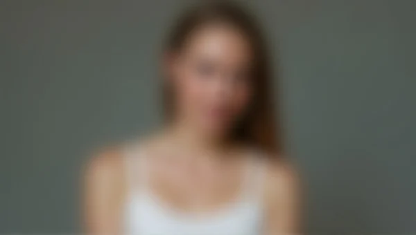 Candid Portrait of Woman in White Top