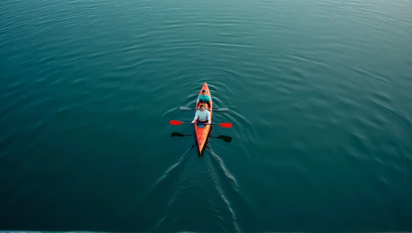 Canoeing Adventure on Calm Water Surface