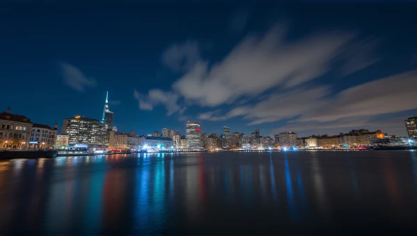 City Waterfront Night Lights Reflection Trails