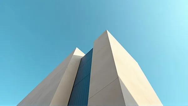 Concrete Building Geometric Facades Against Sky