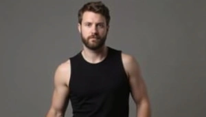 Confident Man Portrait in Black Sleeveless Top