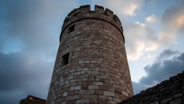 Cylindrical Stone Wall Tower With Dramatic Sky