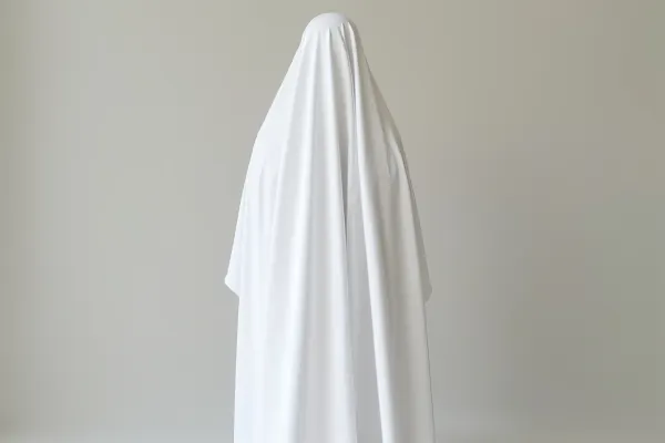 Draped White Textile Figure Full-Body Studio Shot