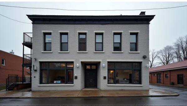 Gray Concrete Building With Symmetrical Windows