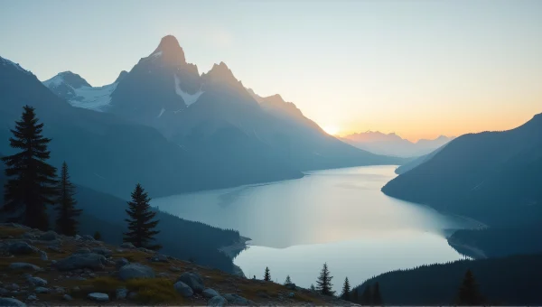 Jagged Mountain Range at Dawn with Calm Lake