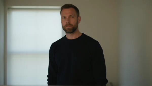 Man In Black Sweater Soft Window Backlight Portrait
