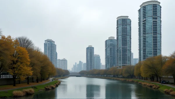 Mid-Rise Buildings By River With Leafy Trees