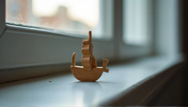 Miniature Wooden Ship On Windowsill Morning Light