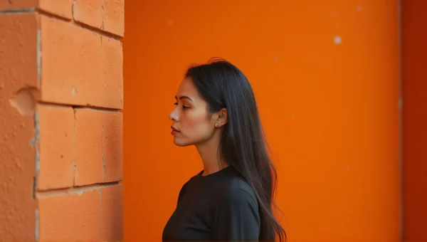 Modern Woman Urban Fashion Against Orange Wall