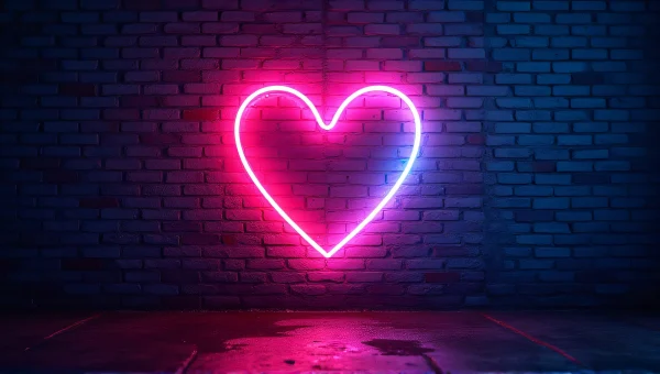 Neon Heart Signage On Dark Wall With Reflections