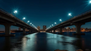 Nighttime Concrete Bridge With Reflective River View