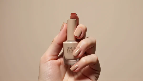 Nude Nail Polish Bottle Hand Close-Up