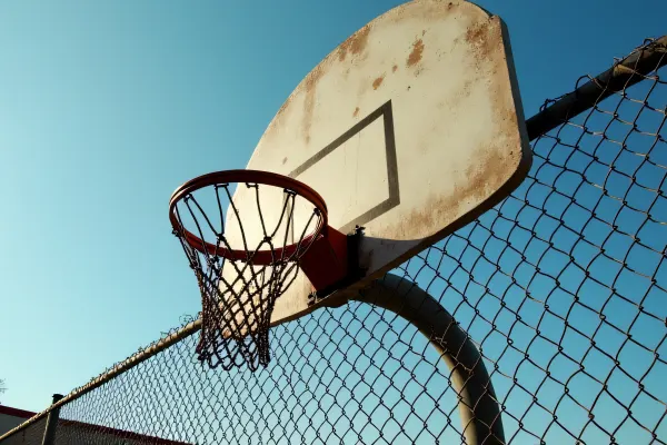 Outdoor Basketball Hoop On Chain-Link Fence