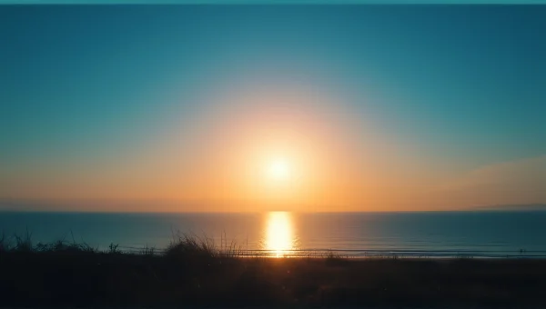 Panoramic Sunset Silhouette Over Gentle Sea