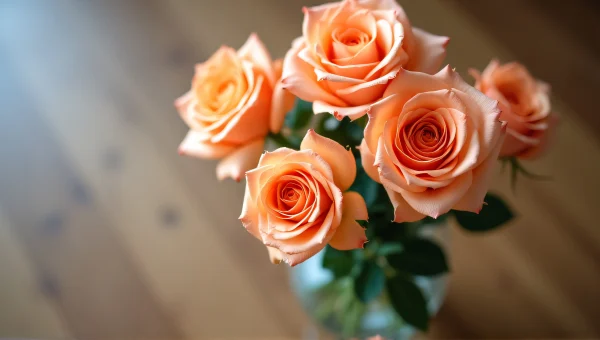 Peach Roses Bouquet In Glass Vase On Table