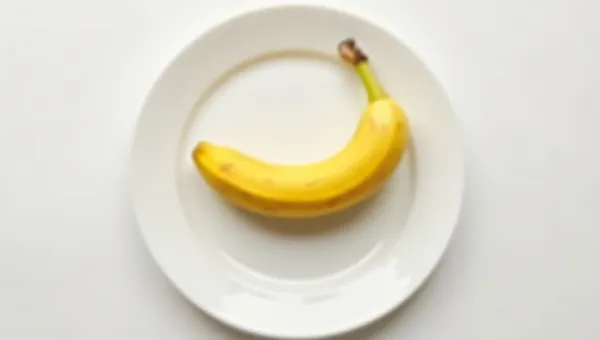 Ripe Yellow Banana On White Ceramic Plate
