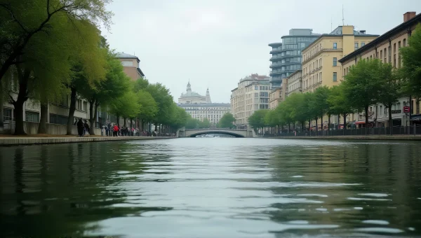 River Flowing By Trees And Buildings Pathway