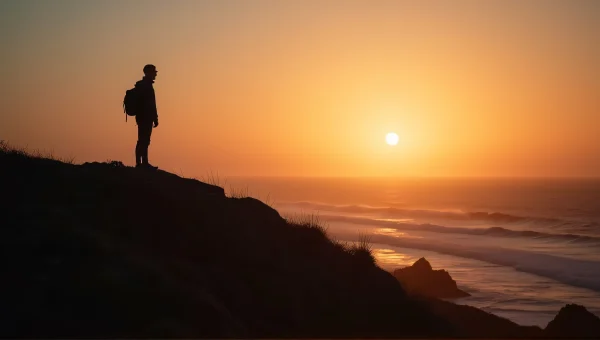 Silhouette Man Cliff Dusk Backlit Sunlight