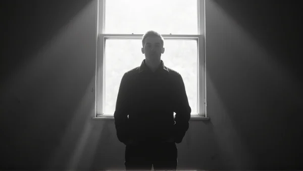 Solitary Man Portrait Under Soft Window Light