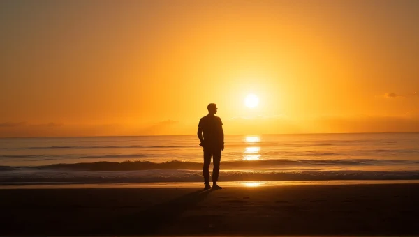 Solitary Man Silhouette at Serene Shoreline