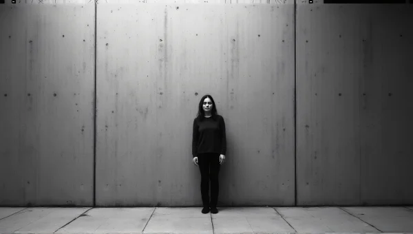 Solitary Person Portrait Against Textured Wall