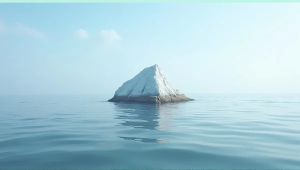 Solitary White Rock Formation in Calm Sea